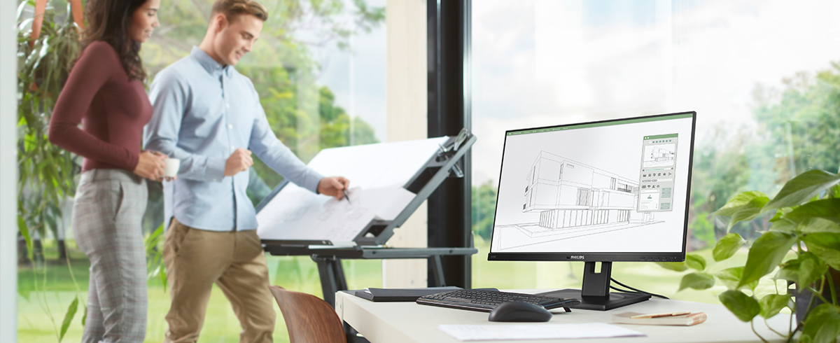 Ihmiset nauttivat ty&ouml;paikasta Philipsin vihreiden, ymp&auml;rist&ouml;yst&auml;v&auml;llisten n&auml;ytt&ouml;jen kanssa.