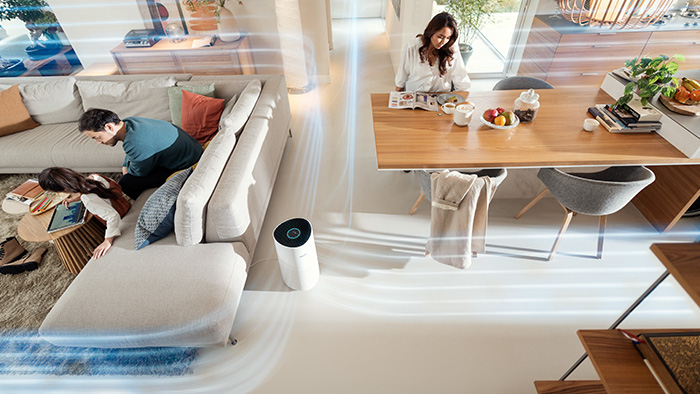 Optimaalinen suorituskyky &ndash; perhe istumassa olohuoneessa